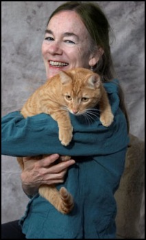 Penelope Smith with Ollie orange tabby cat